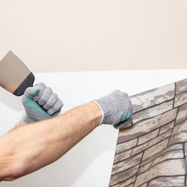 man-hand-tear-off-old-light-wallpaper-from-wall-preparing-home-repair-work-removing-wallpaper-with-spatula-process-updating-wall-room-repair-copy-space_1900x1267_600x600